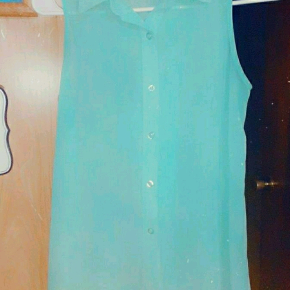 Blue button up see threw tank top.